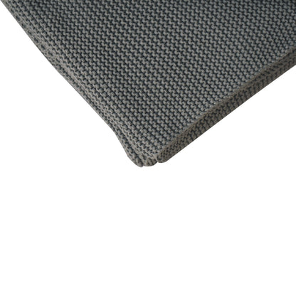 olive green knitted throw
