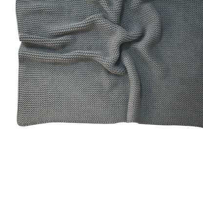 olive green knitted throw