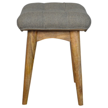 curved grey tweed bench