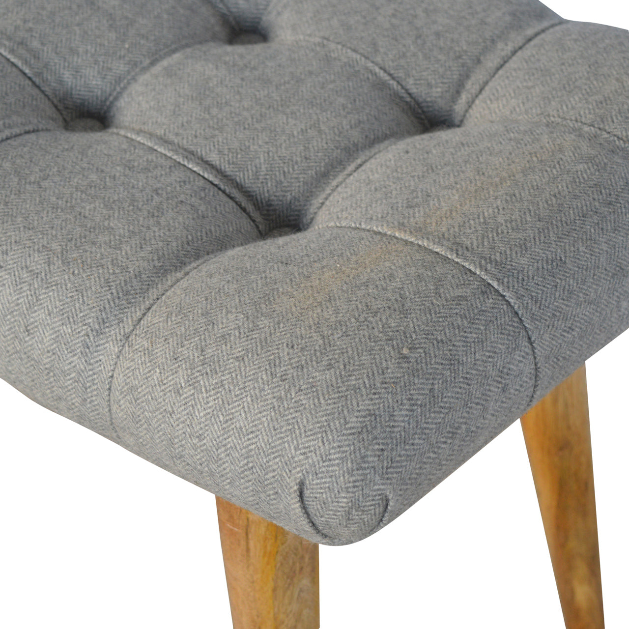 curved grey tweed bench