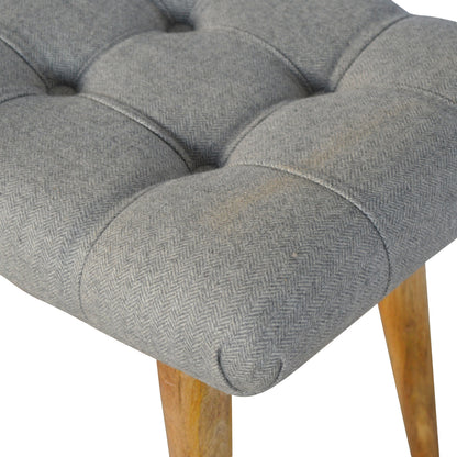 curved grey tweed bench